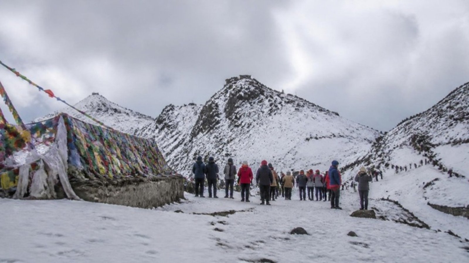 Tourists at snowy Nathula Pass, East Sikkim – Nathula Pass permit guide
